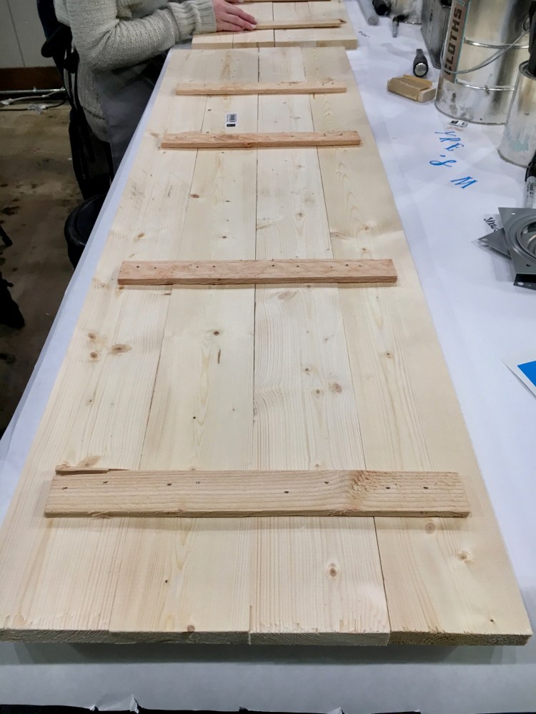 Wooden sign made from 2x4 boards